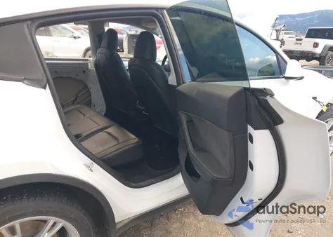 2023 Tesla Model Y Awd/Long Range Dual Motor All-Wheel Drive из США, поврежденный, VIN 7SAYGDEE8PA145633